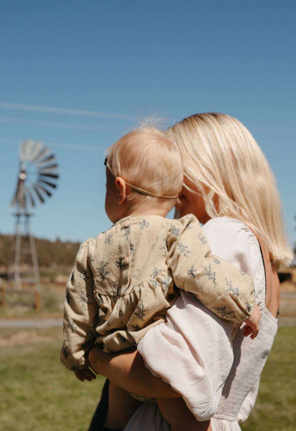 Baby Mabel long sleeve romper back view