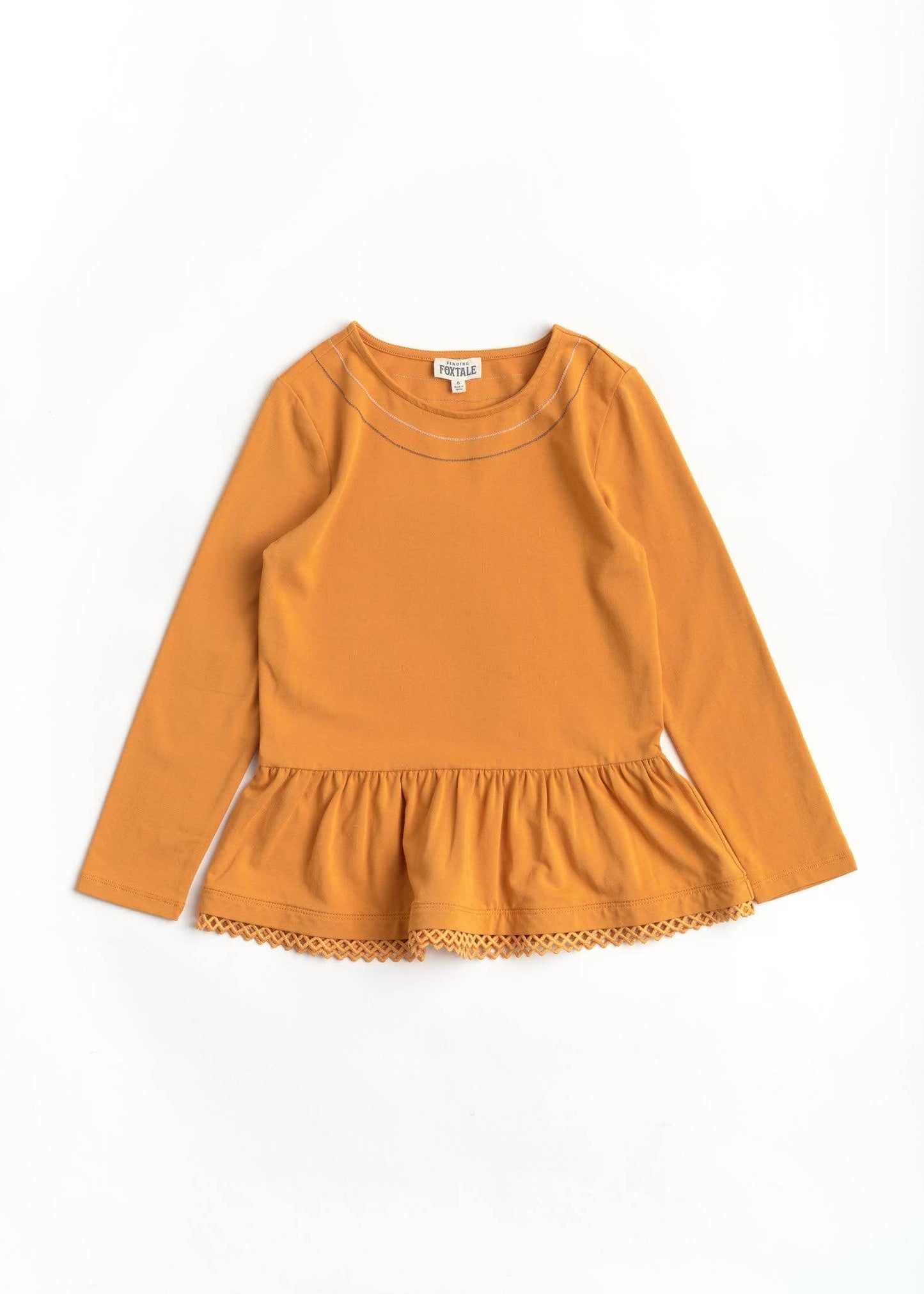 Stay Golden peplum top for girls soft boutique flared hem front view
