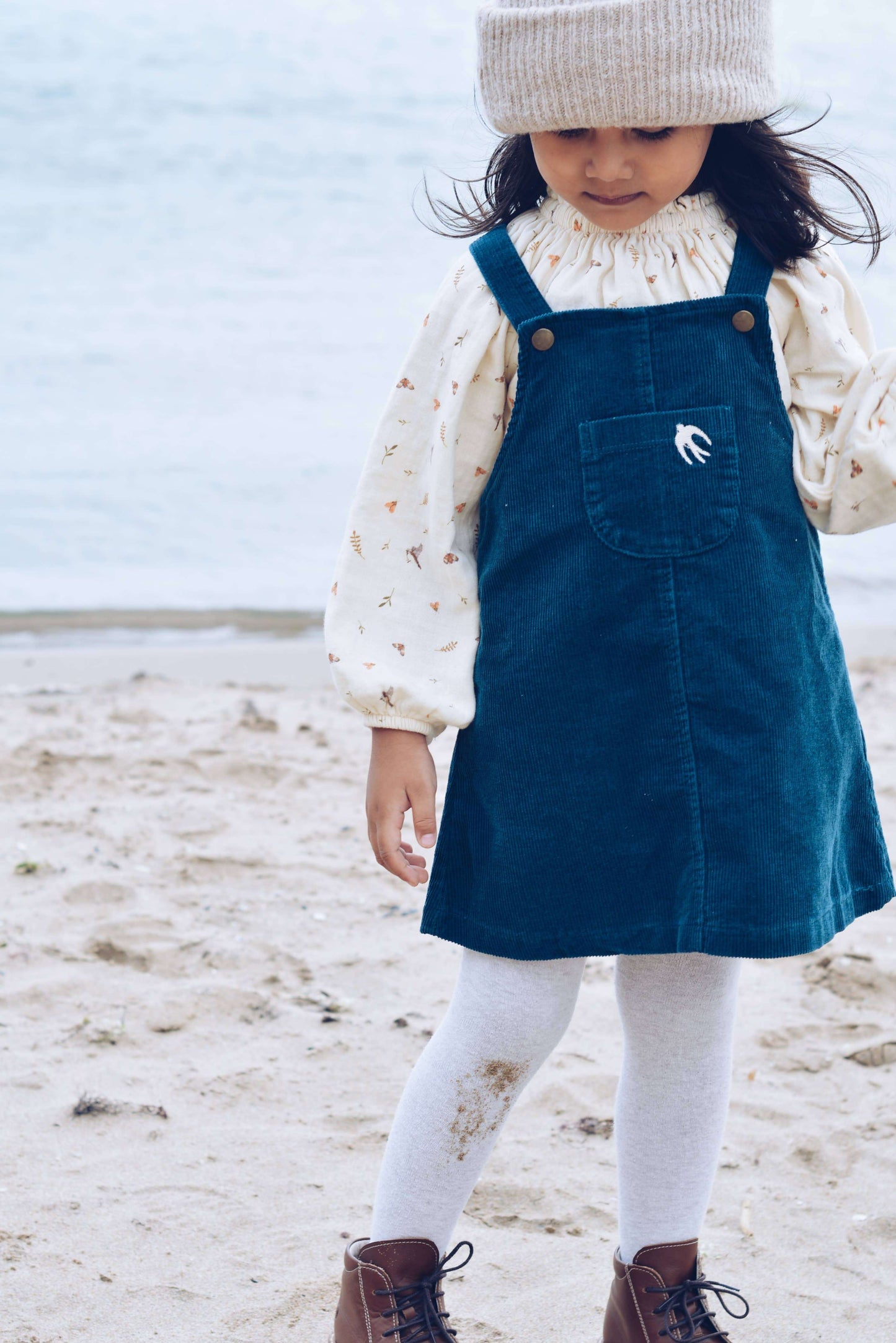 Dove cord dress for girls soft corduroy midi length boutique front view