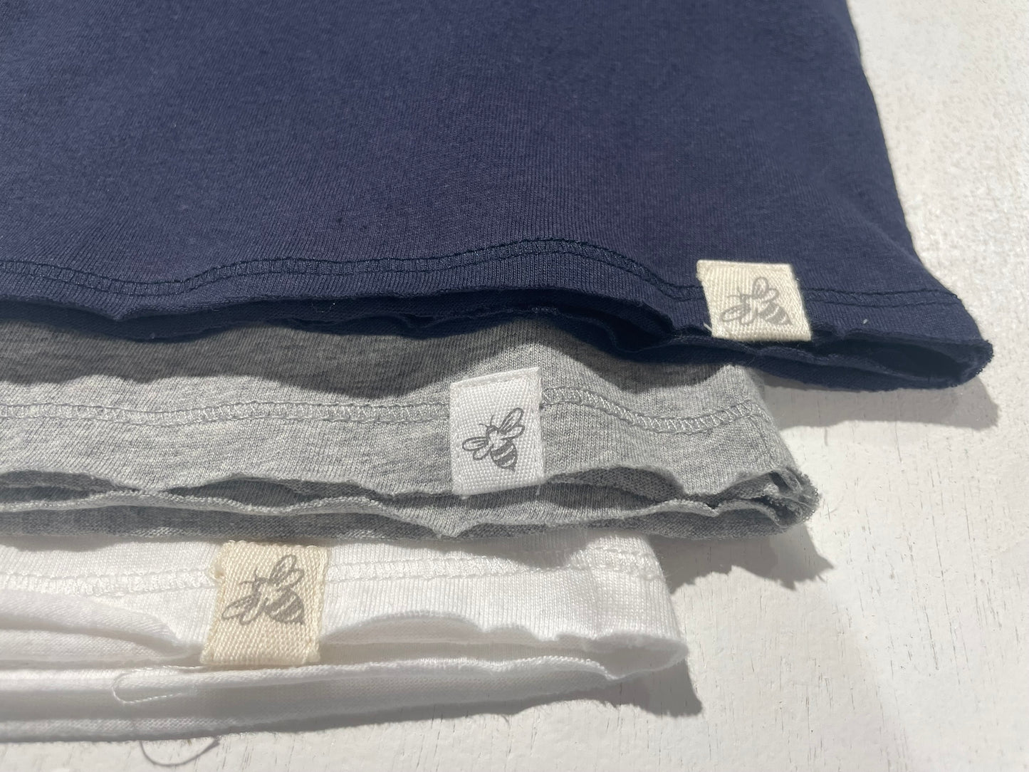 Organic cotton kids v-neck tee flat lay product view