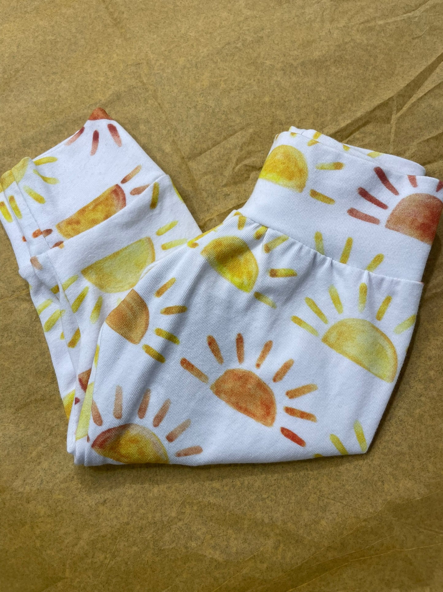 Little Ray of Sunshine leggings close up print detail