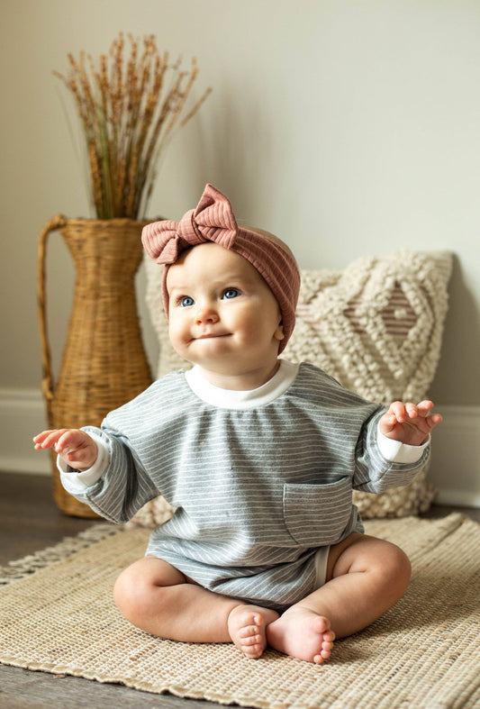 Organic cotton oversized striped bubble romper for babies soft cozy front view