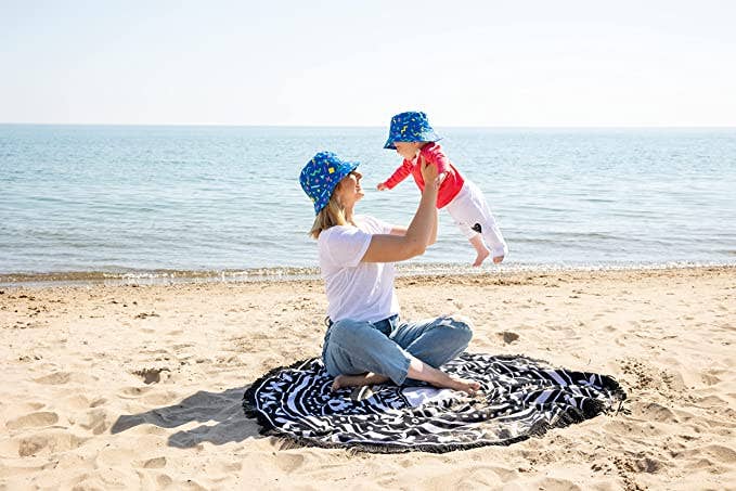 Baby blue 90s print bucket hat worn lifestyle view