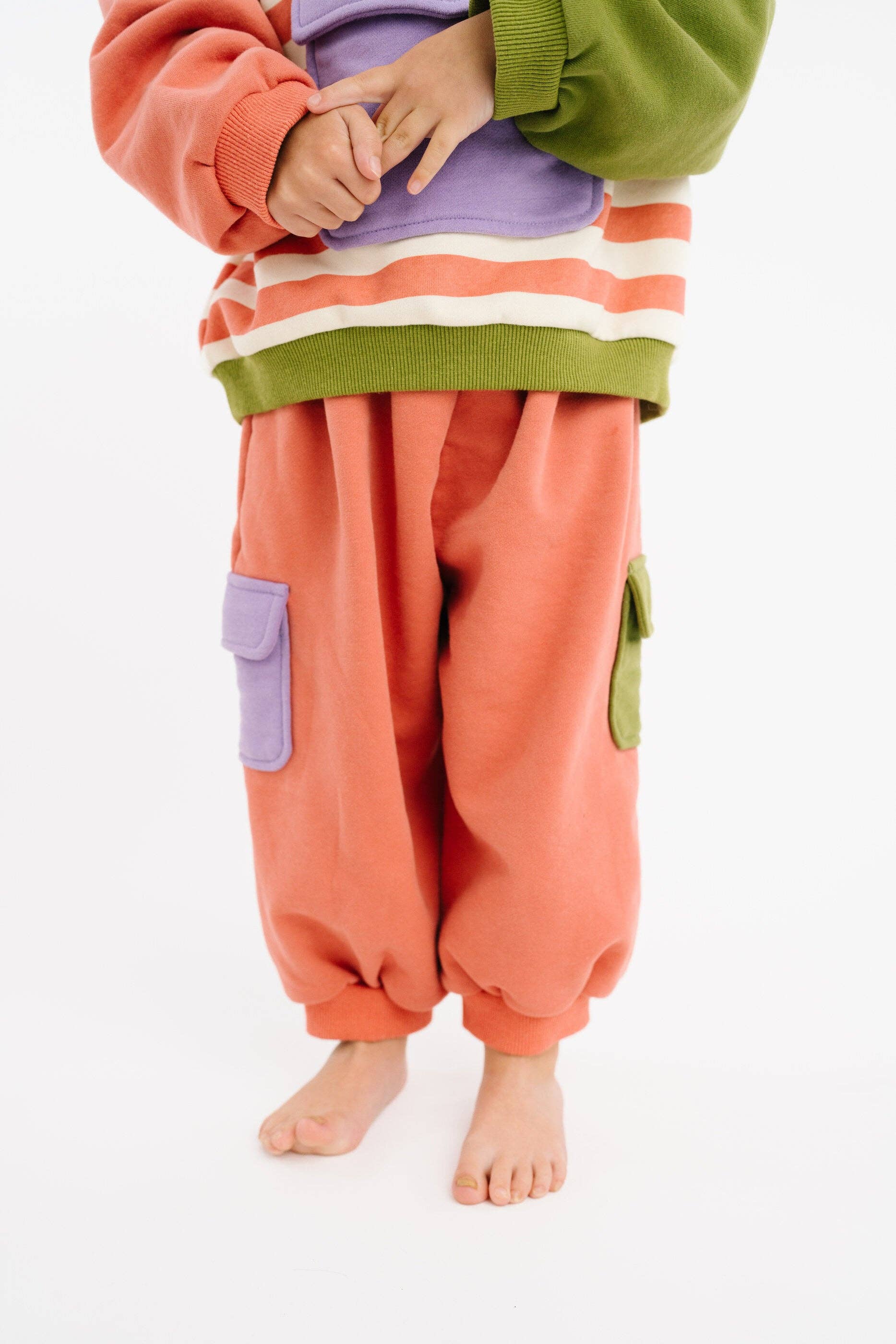 Pastel kids boutique retro sweatsuit flat lay product view