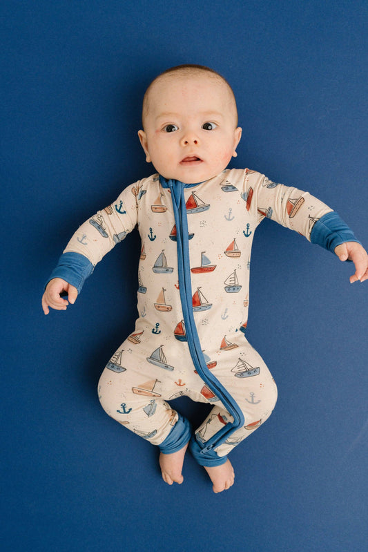 Nautical sail bamboo sleeper for babies soft breathable zip up footie front view