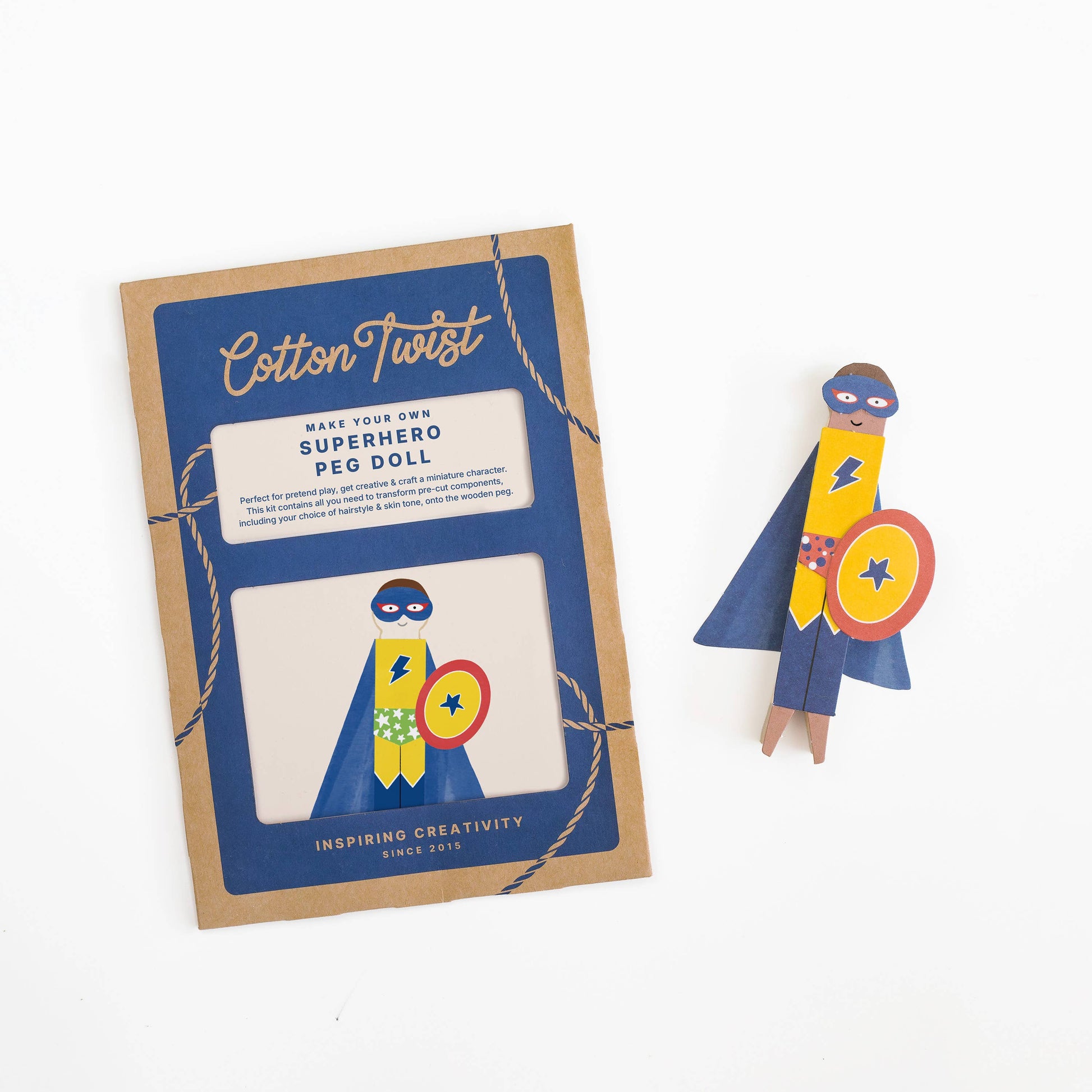 Kids superhero peg doll craft kit full contents spread view