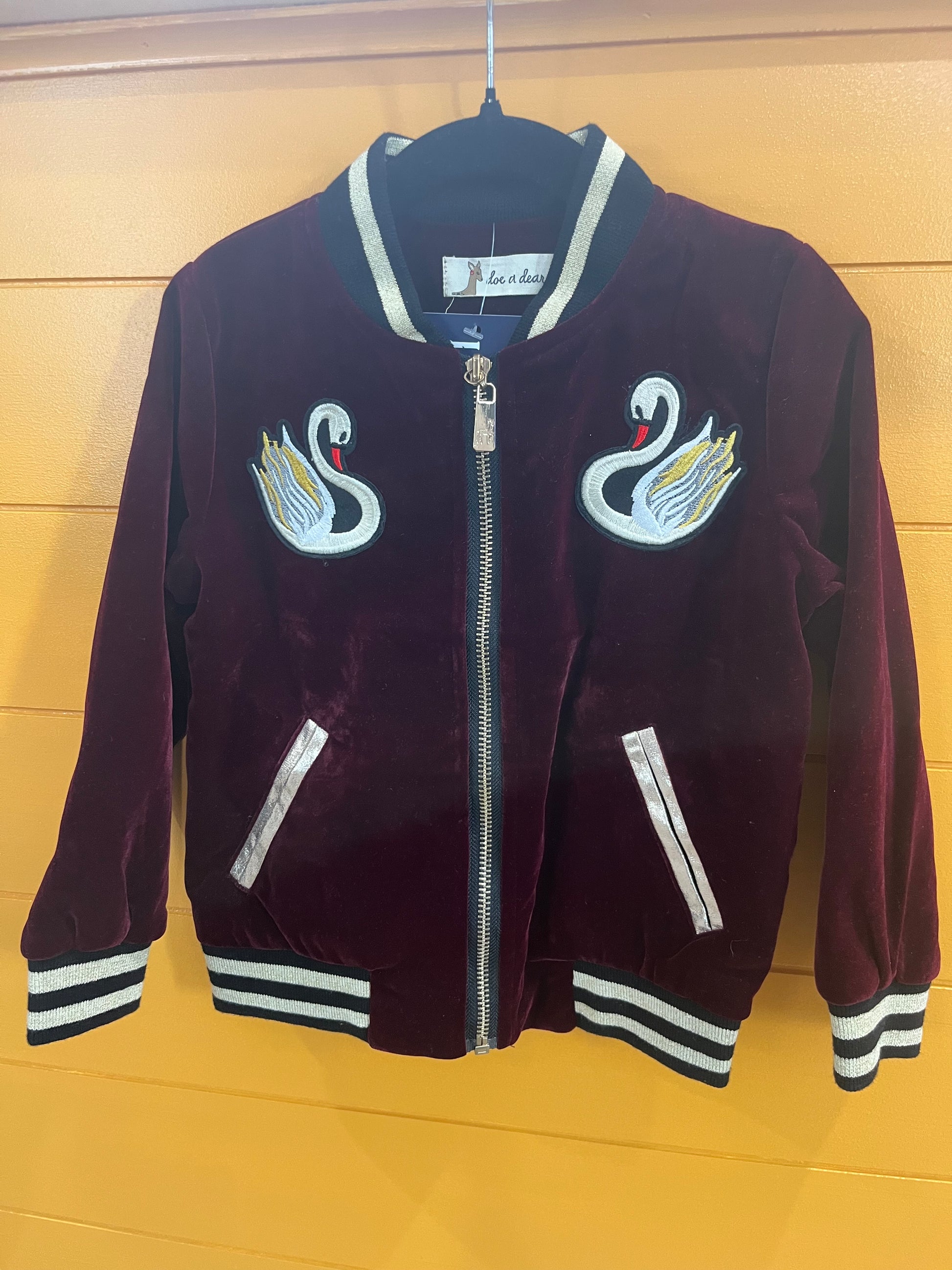 Girls velvet swan jacket worn lifestyle view