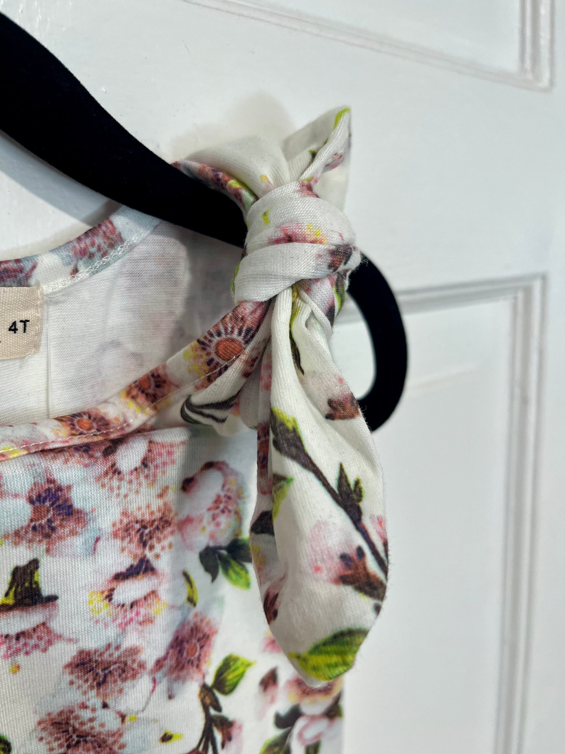 Floral knot shoulder tank for girls close up knot and print detail