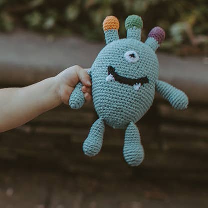 Organic cotton monster rattle for babies soft squeaky toy front view