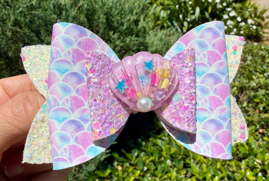 Pastel mermaid scale hair bow for girls purple blue vegan leather with shell charm front view