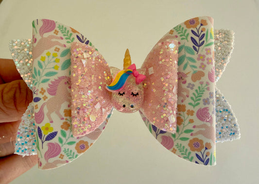 Floral unicorn hair bow for girls handmade 4 inch vegan leather with unicorn charm front view