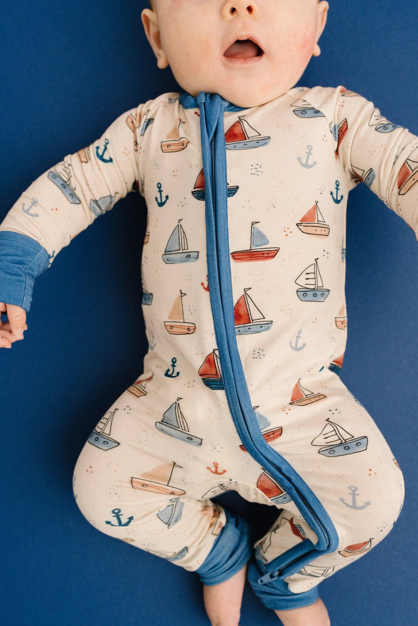 Baby nautical bamboo sleeper with fold over mittens and footies lifestyle view