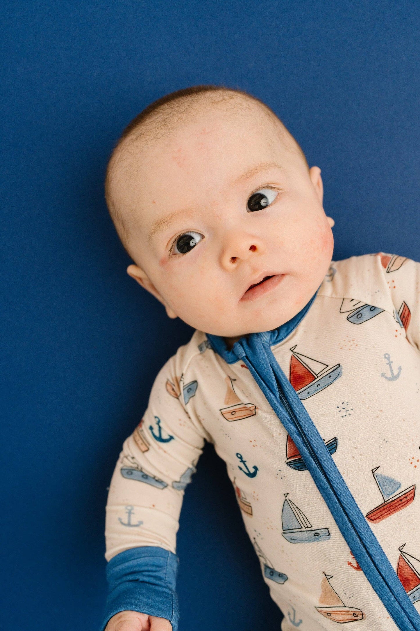 Nautical sail infant sleeper with snug safe fit and 2-way zipper back view