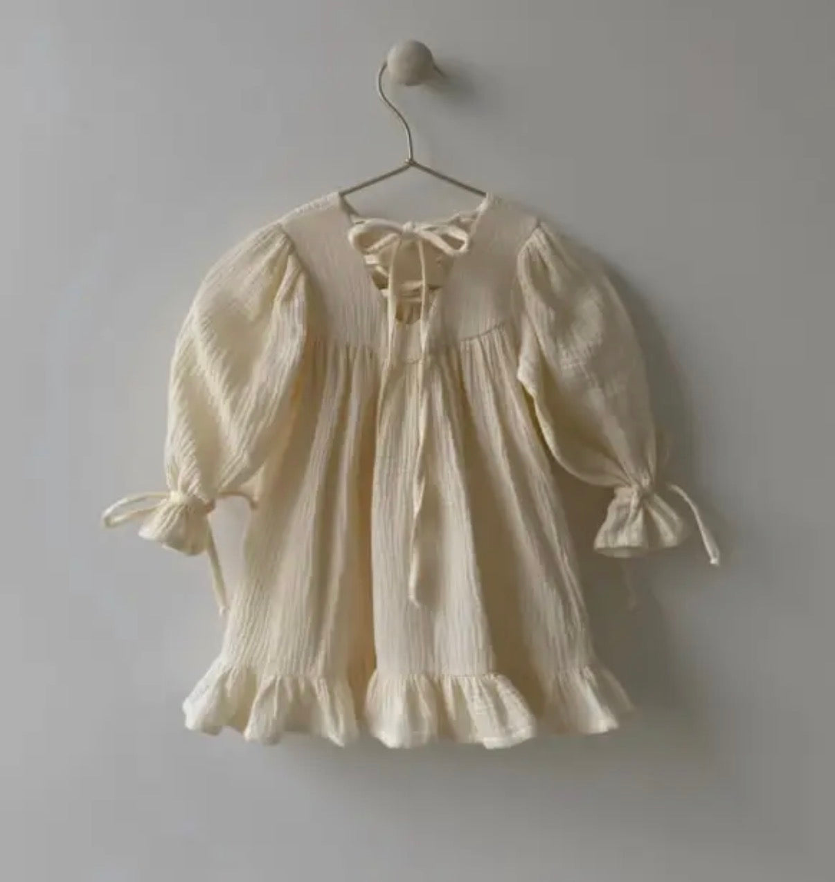 Girls organic muslin dress worn lifestyle view