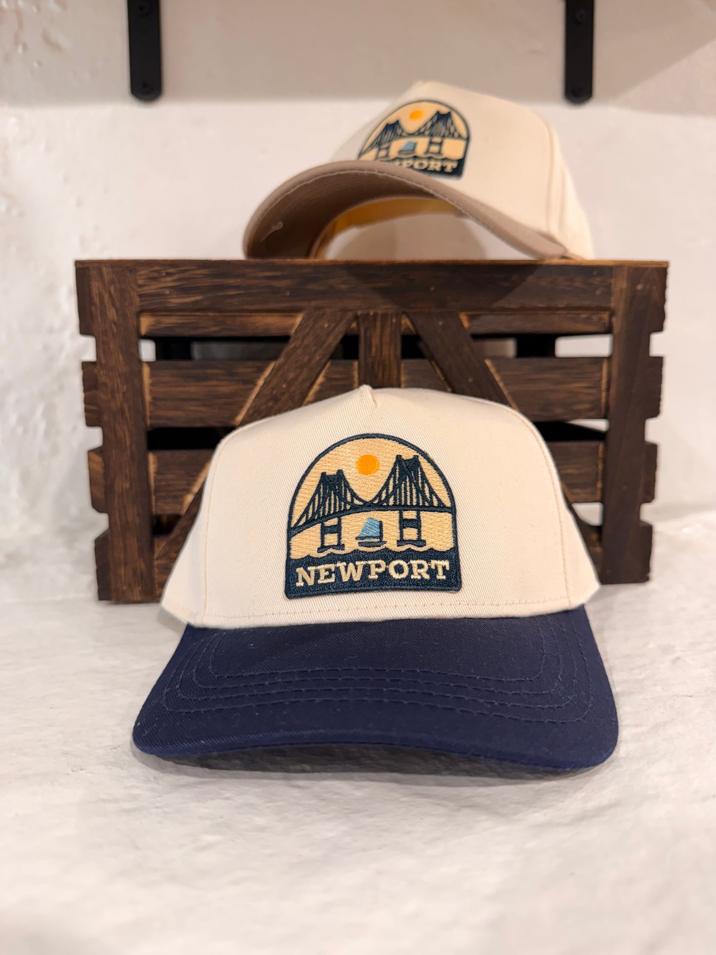 Sunwray Newport Bridge patch cream and navy kids cap worn lifestyle view
