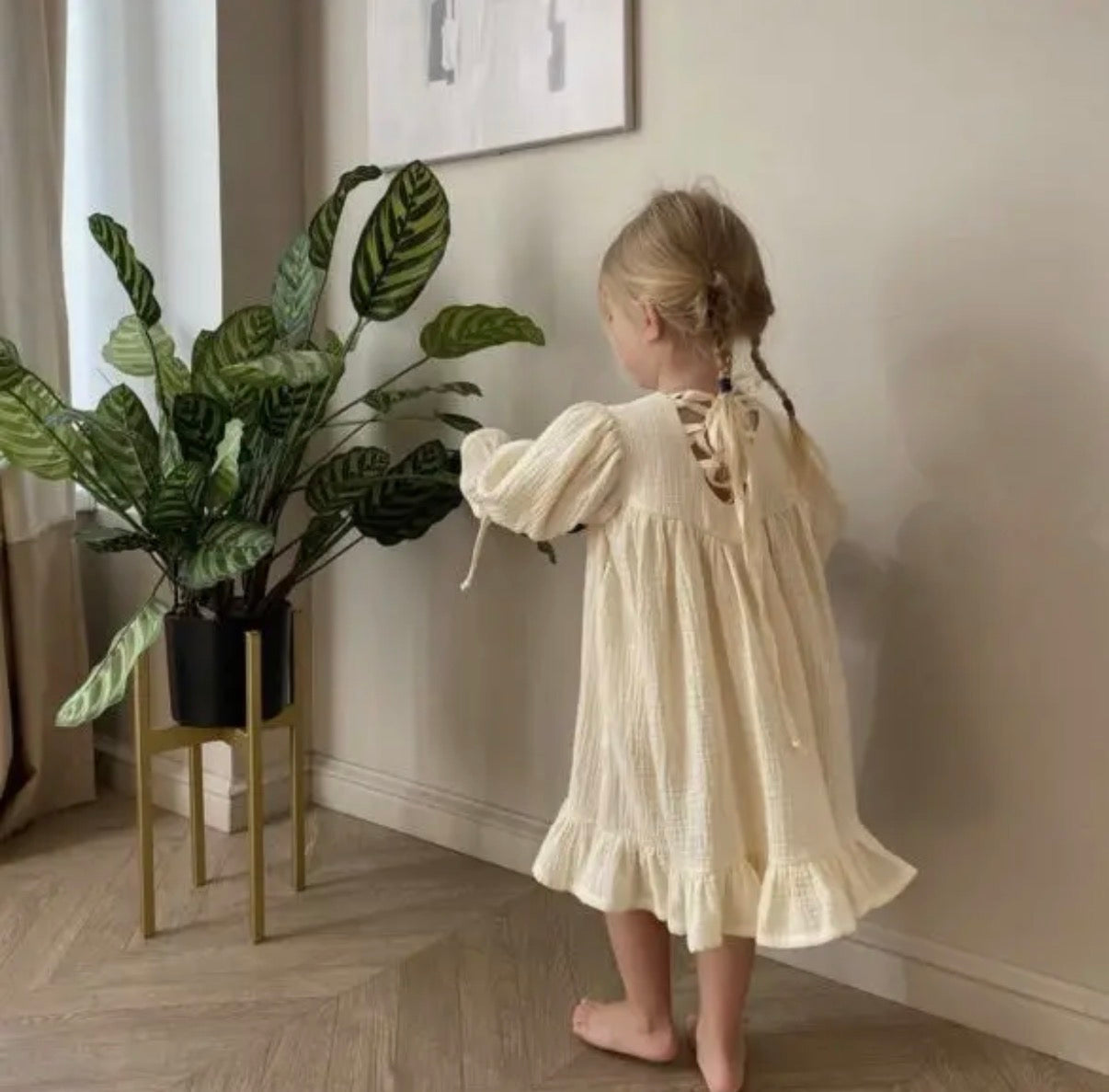 Organic muslin kids dress close up fabric and hem detail