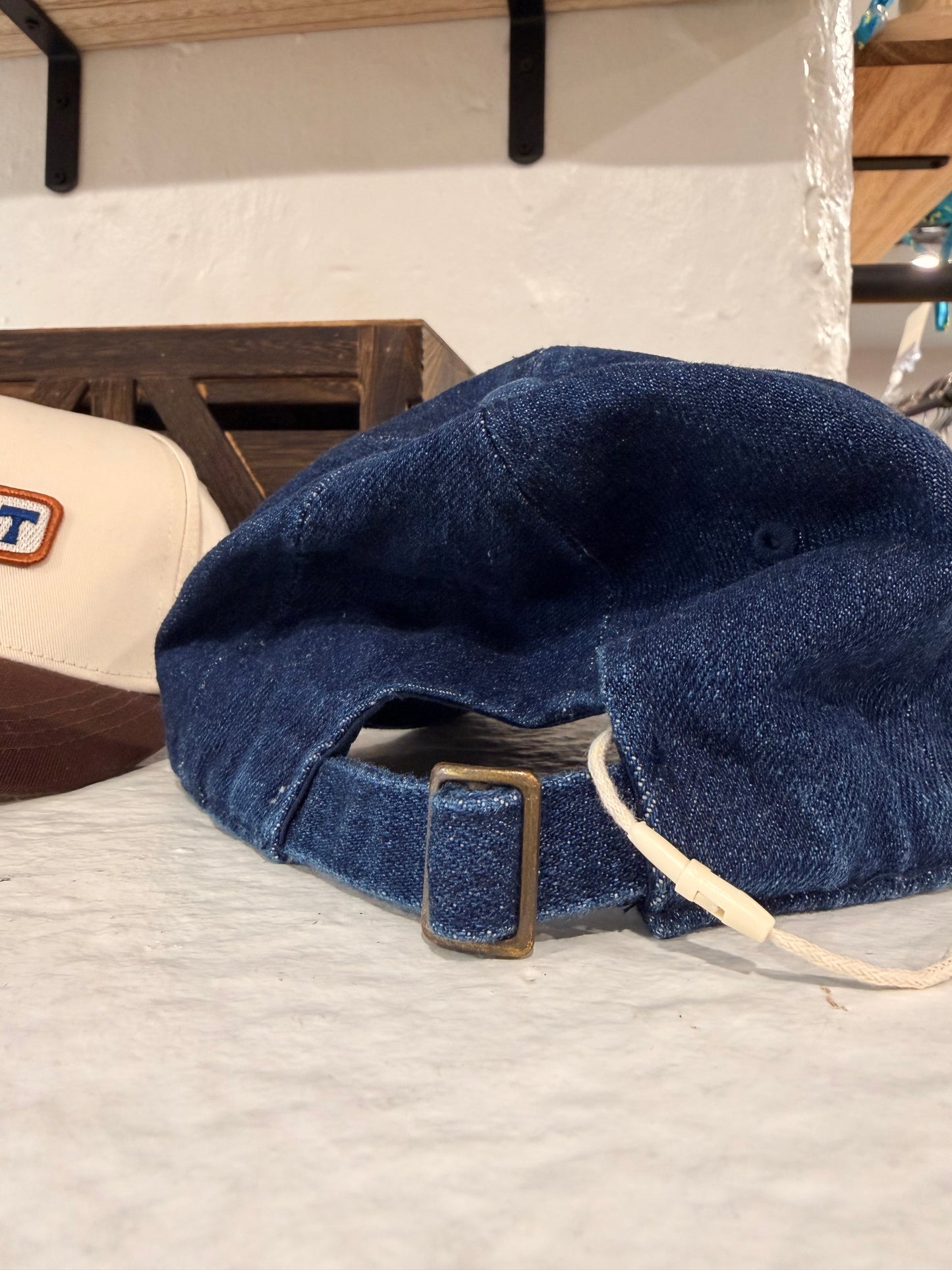 Sunwray Newport denim cap close up patch detail blue lettering orange border