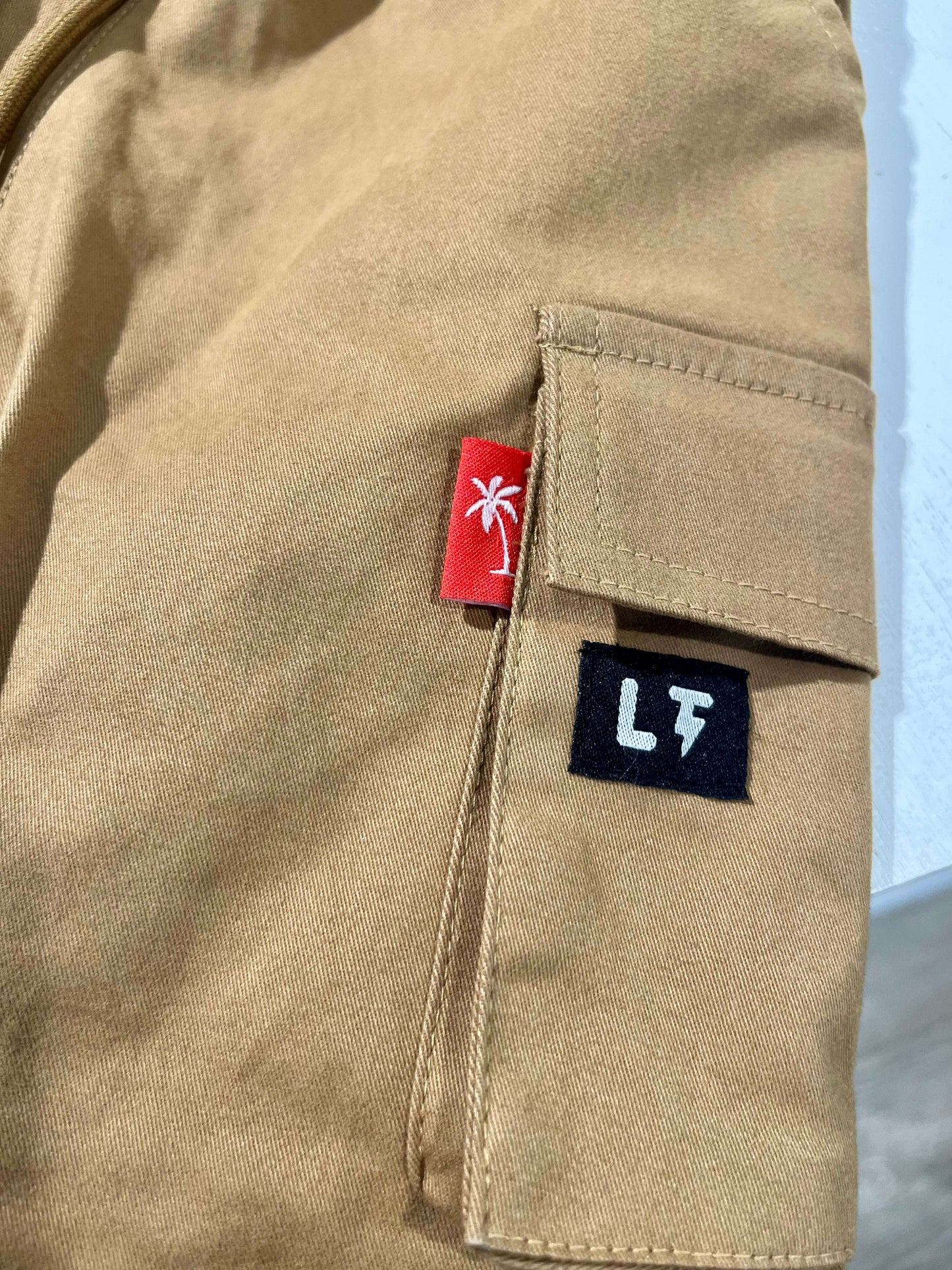 Sick cargos kids pants flat lay product view