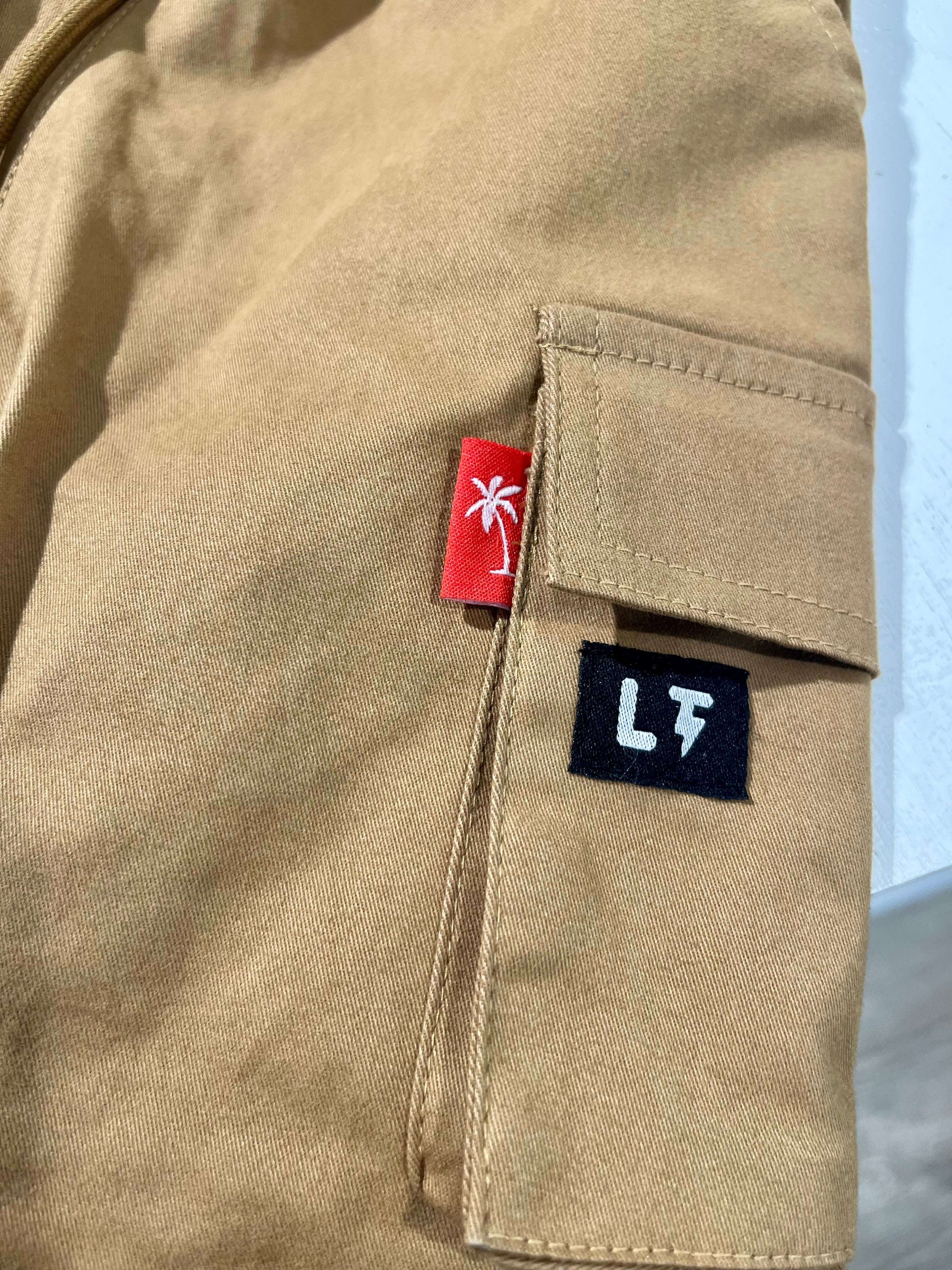 Sick cargos kids pants flat lay product view