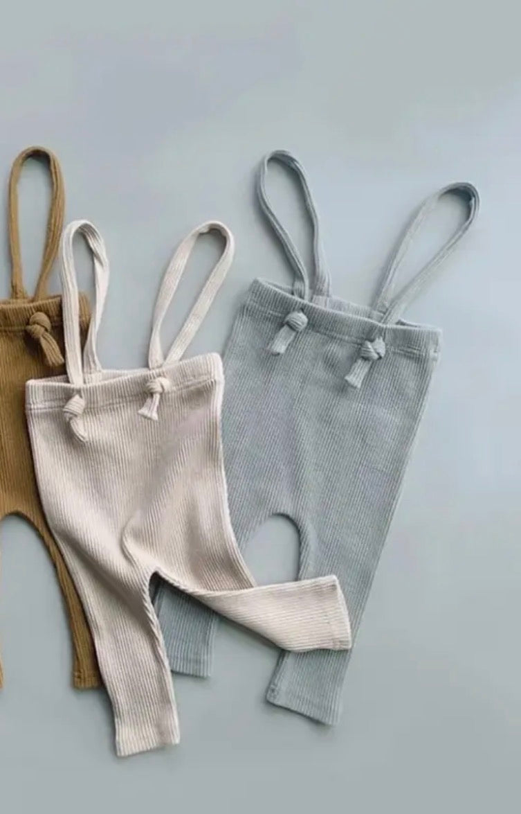 Kids suspender pants close up strap and button detail