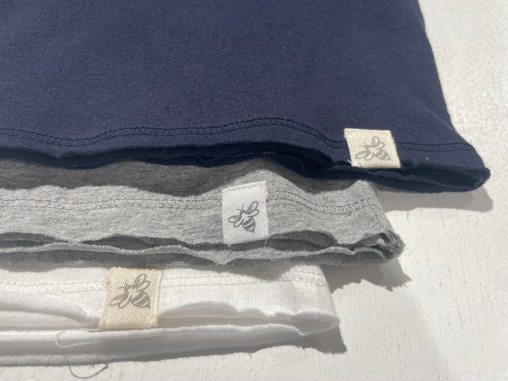 Organic cotton kids v-neck tee flat lay product view