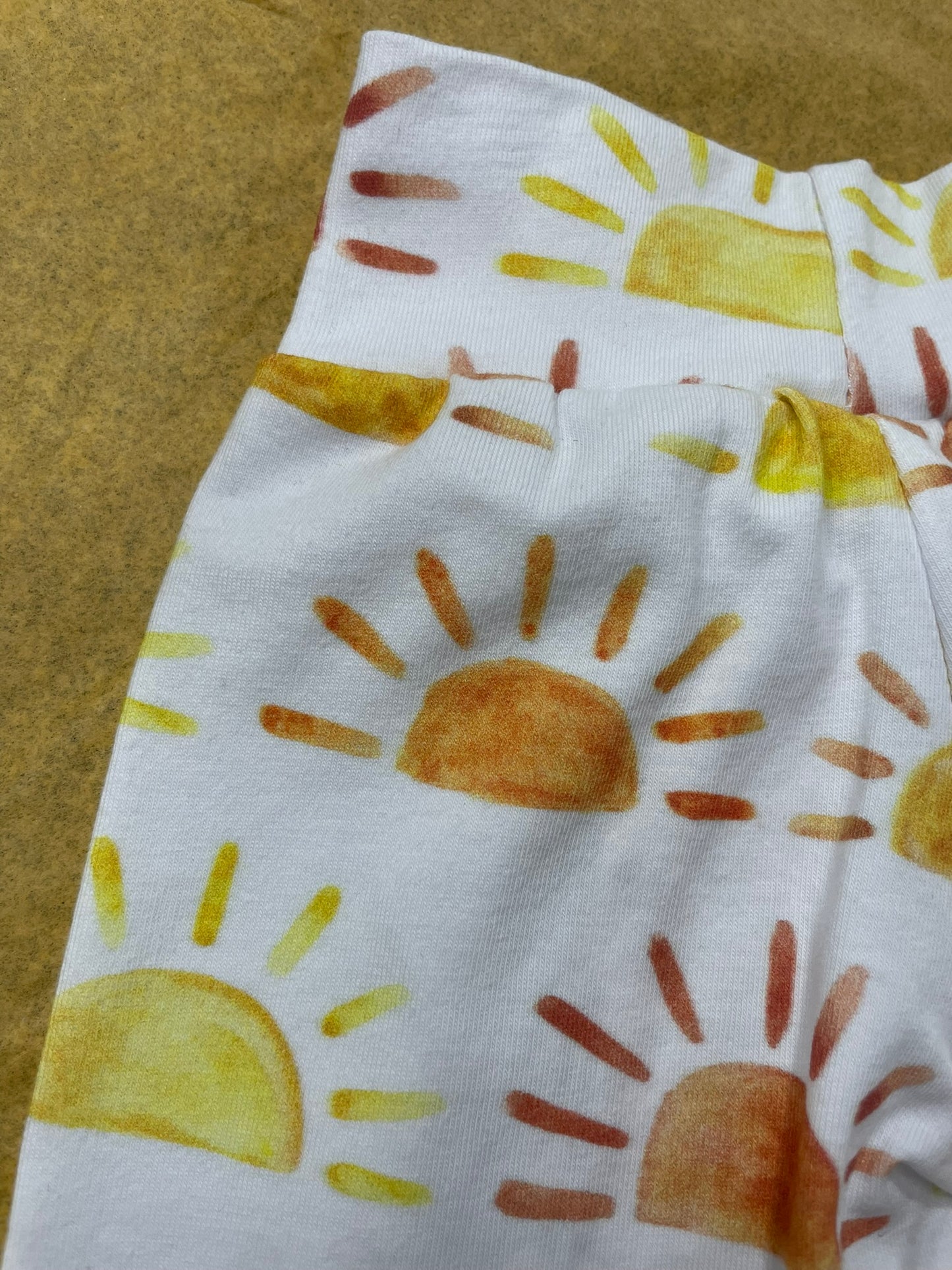 Little Ray of Sunshine baby leggings worn lifestyle view