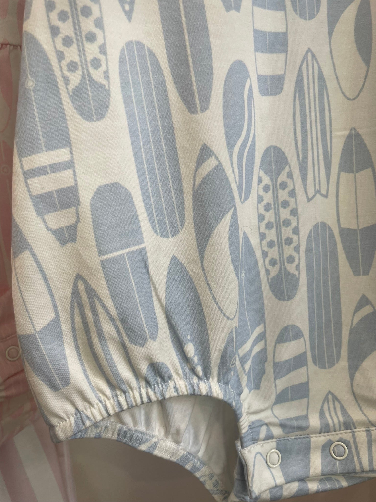 Surf's Up sleeveless bubble romper close up print detail