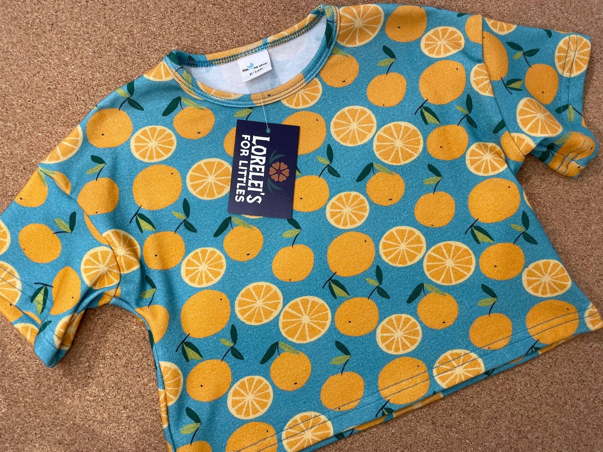 Kids in Orange Breeze slouchy set outdoor view