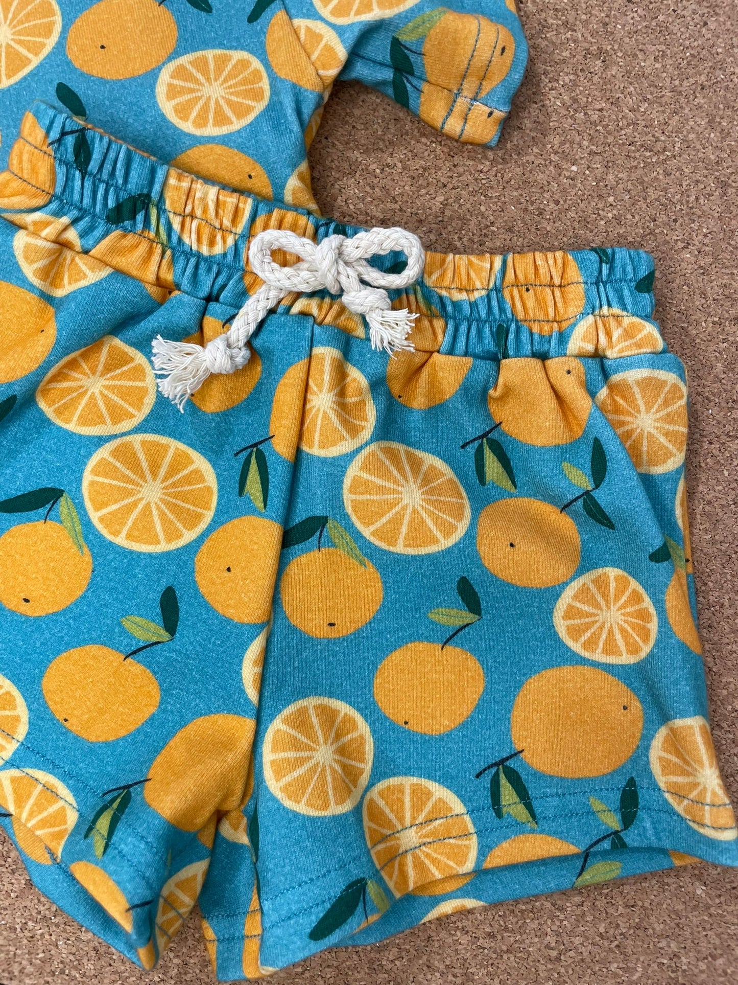 Orange Breeze slouchy set close up fabric detail