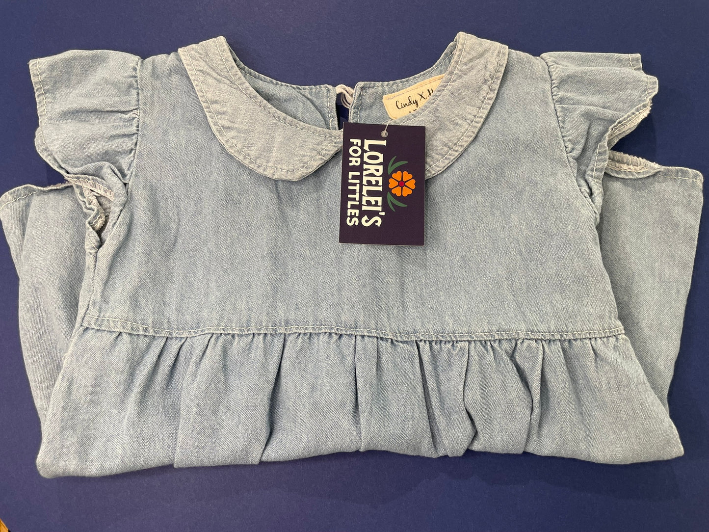 Girls tulip denim dress side view detail
