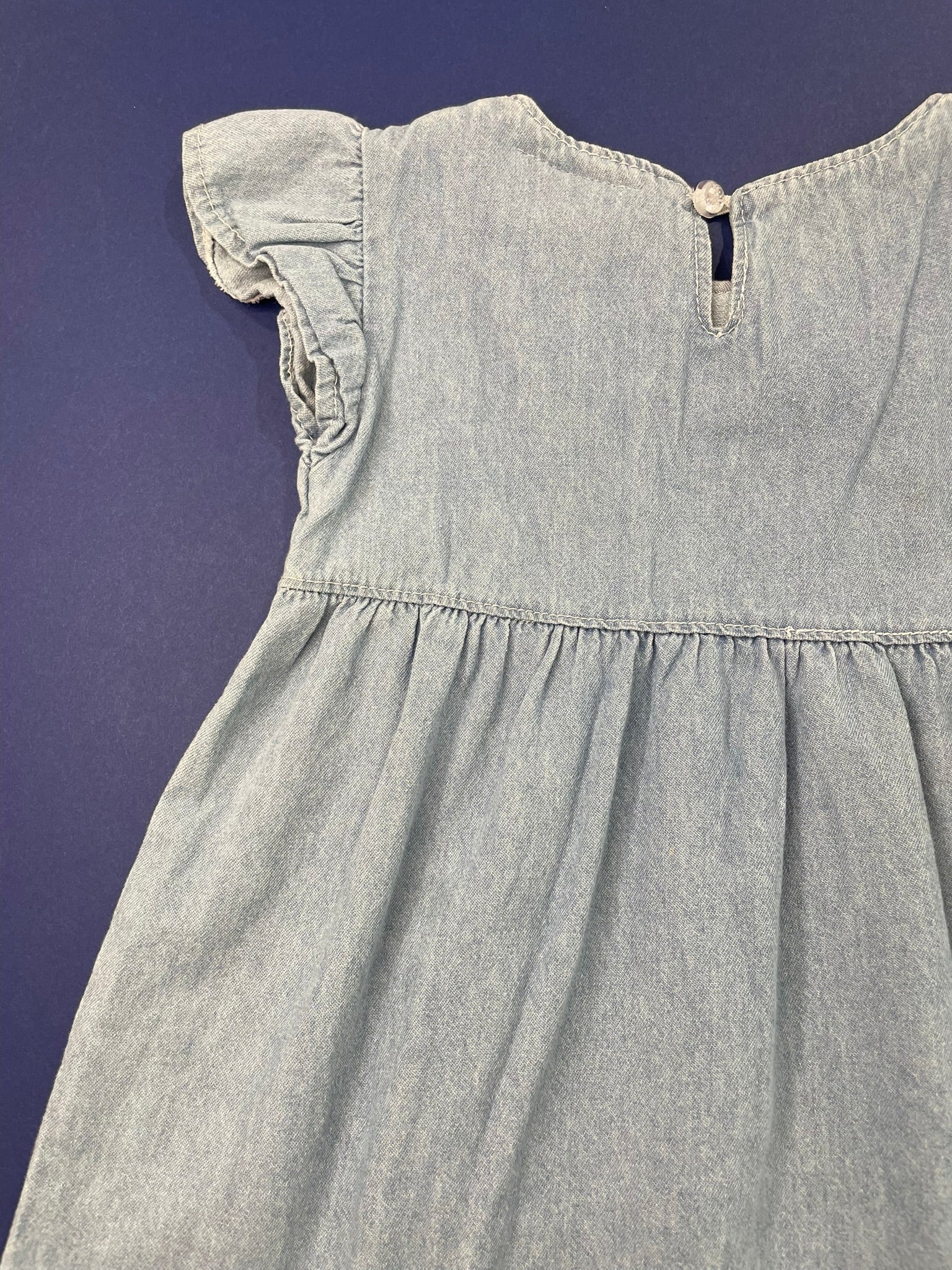 Tulip denim dress close up tulip print and fabric detail