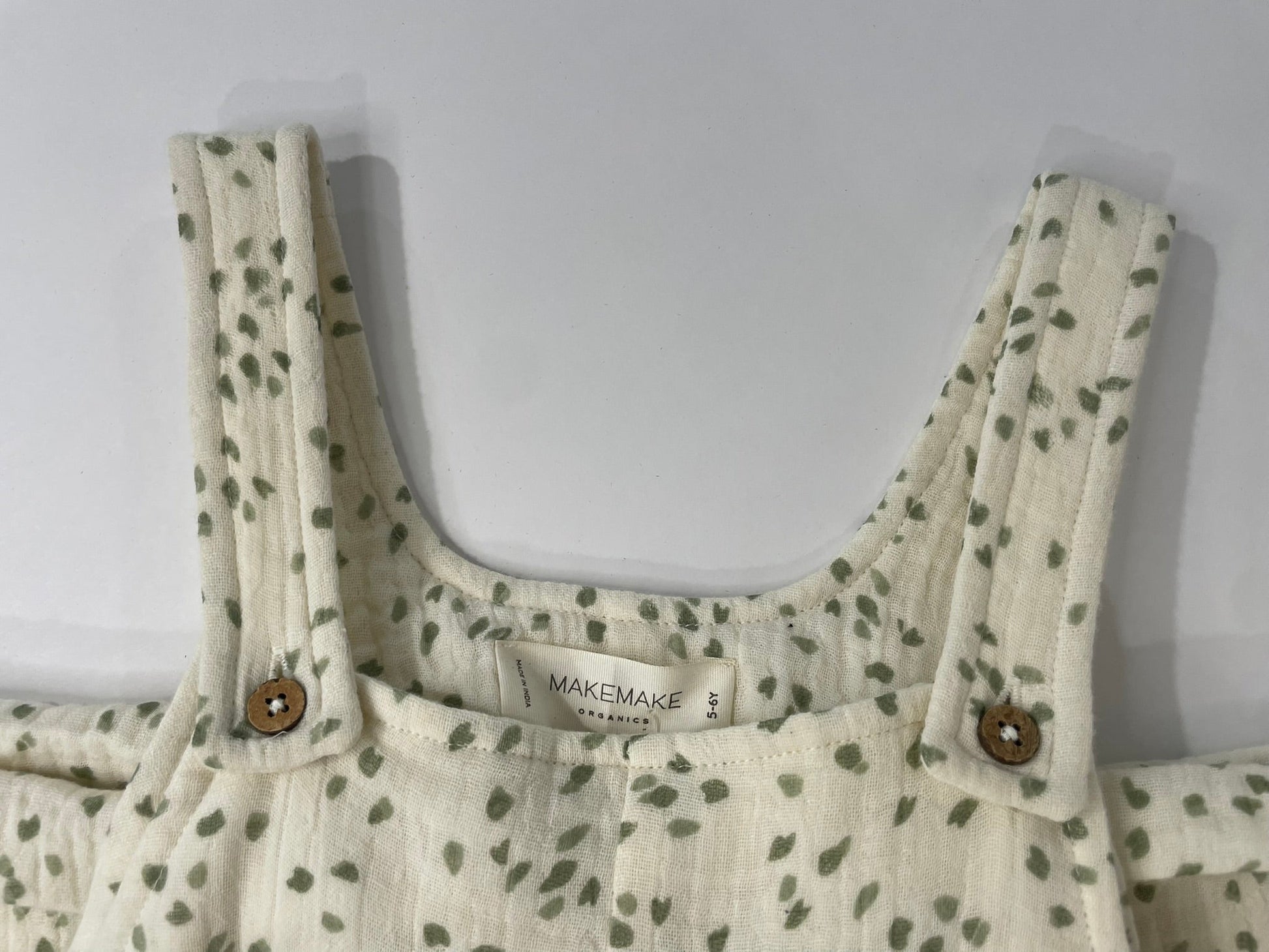 Organic petal shortalls flat lay product view
