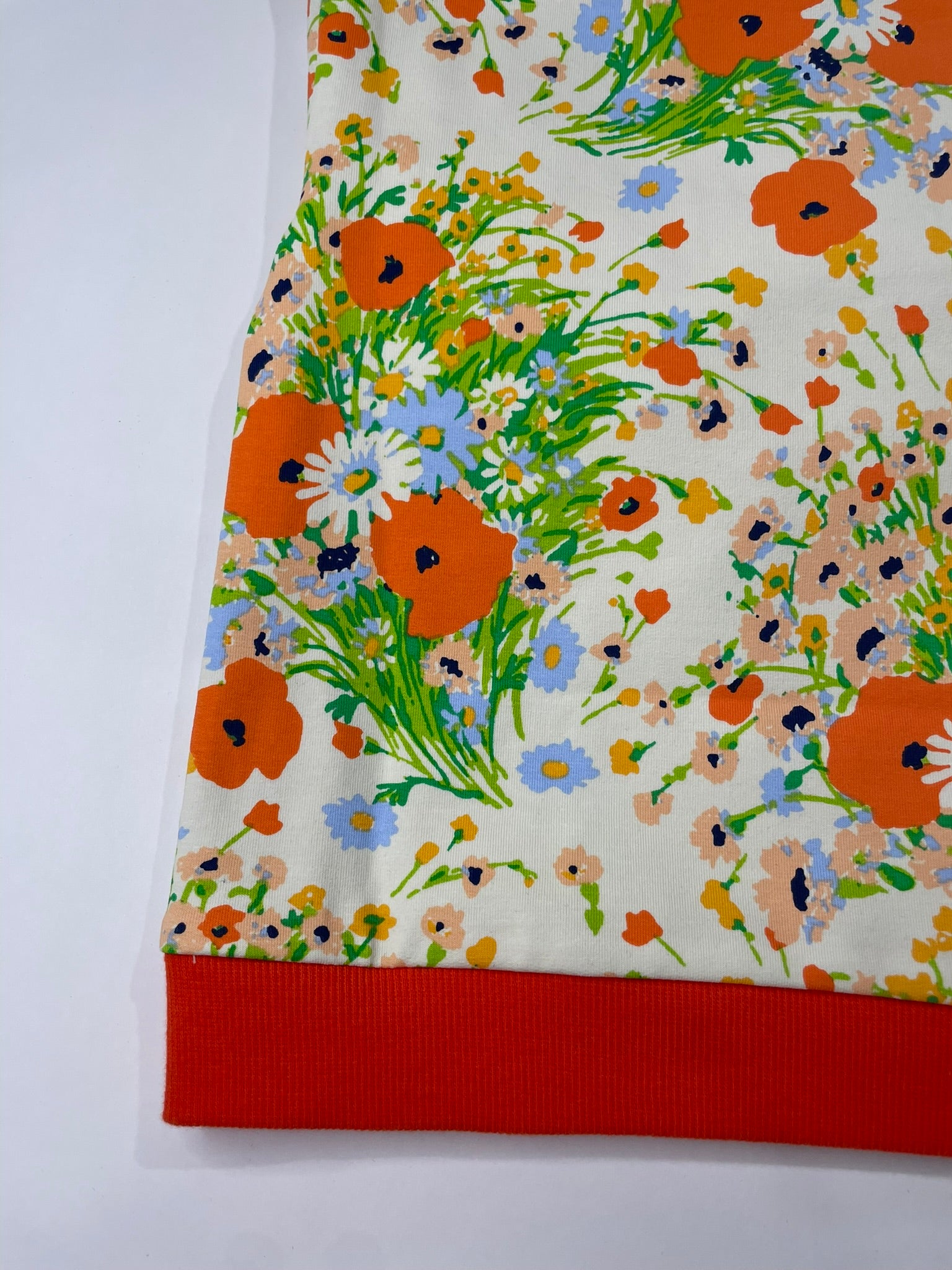 Poppy floral organic cotton pullover flat lay product view