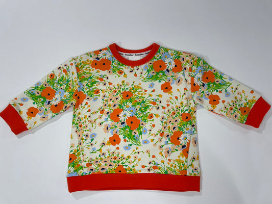 Poppy floral organic cotton pullover for kids worn lifestyle view