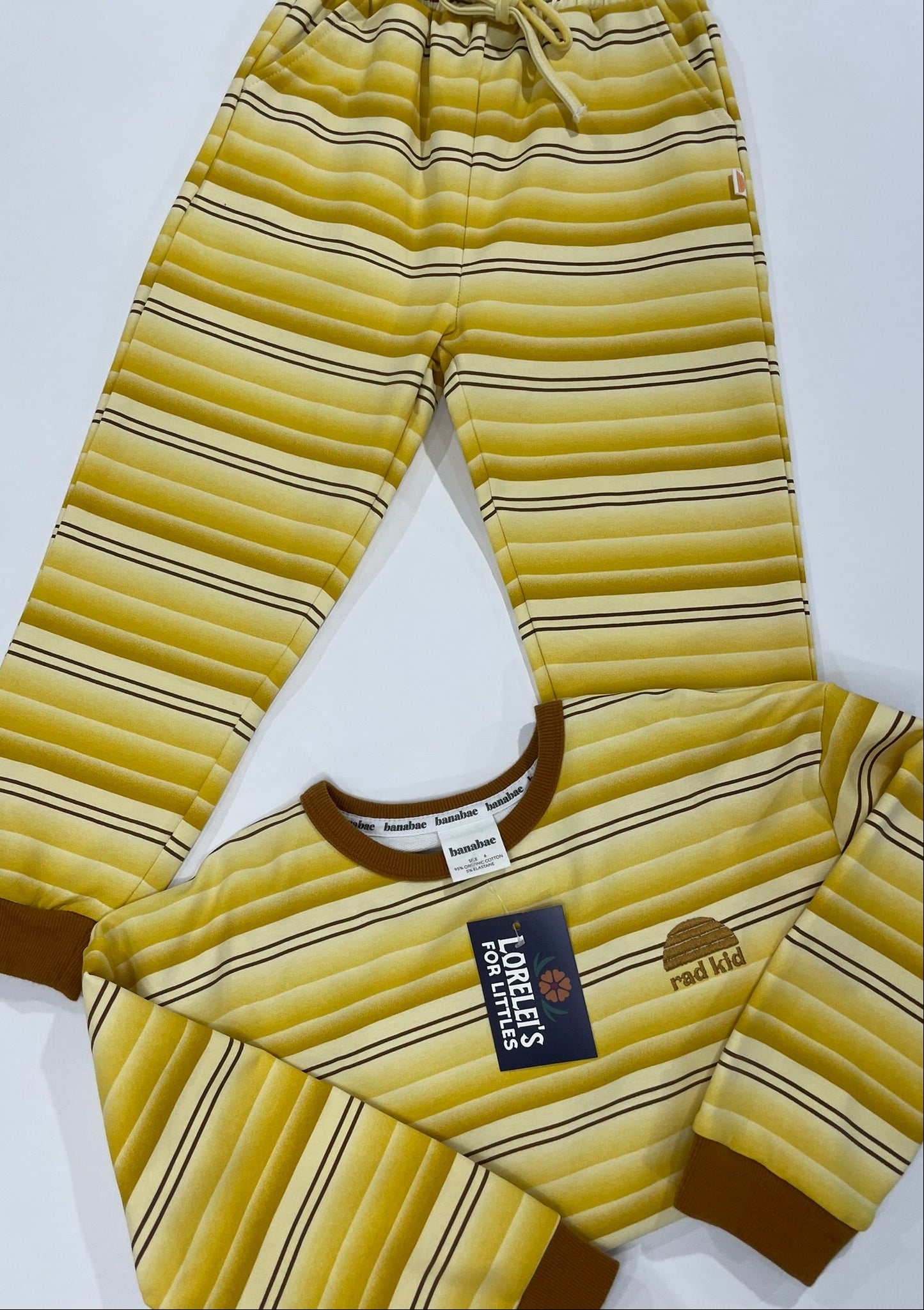 Kids in retro stripe organic set outdoor view