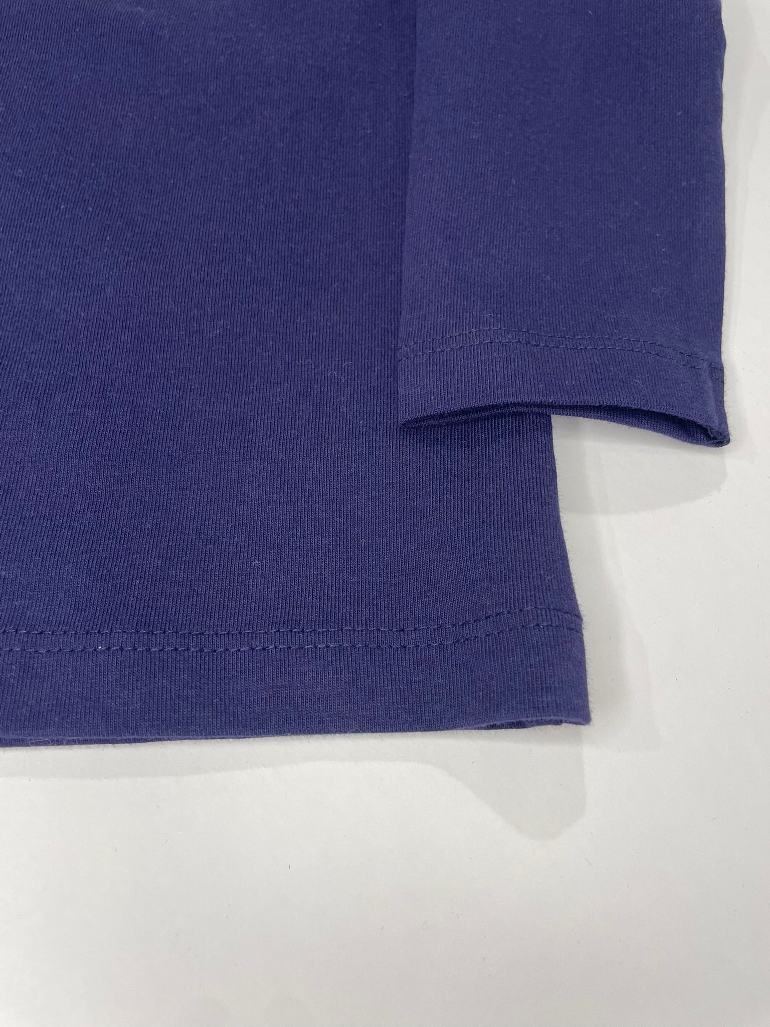 Close-up of blue fabric on a white background