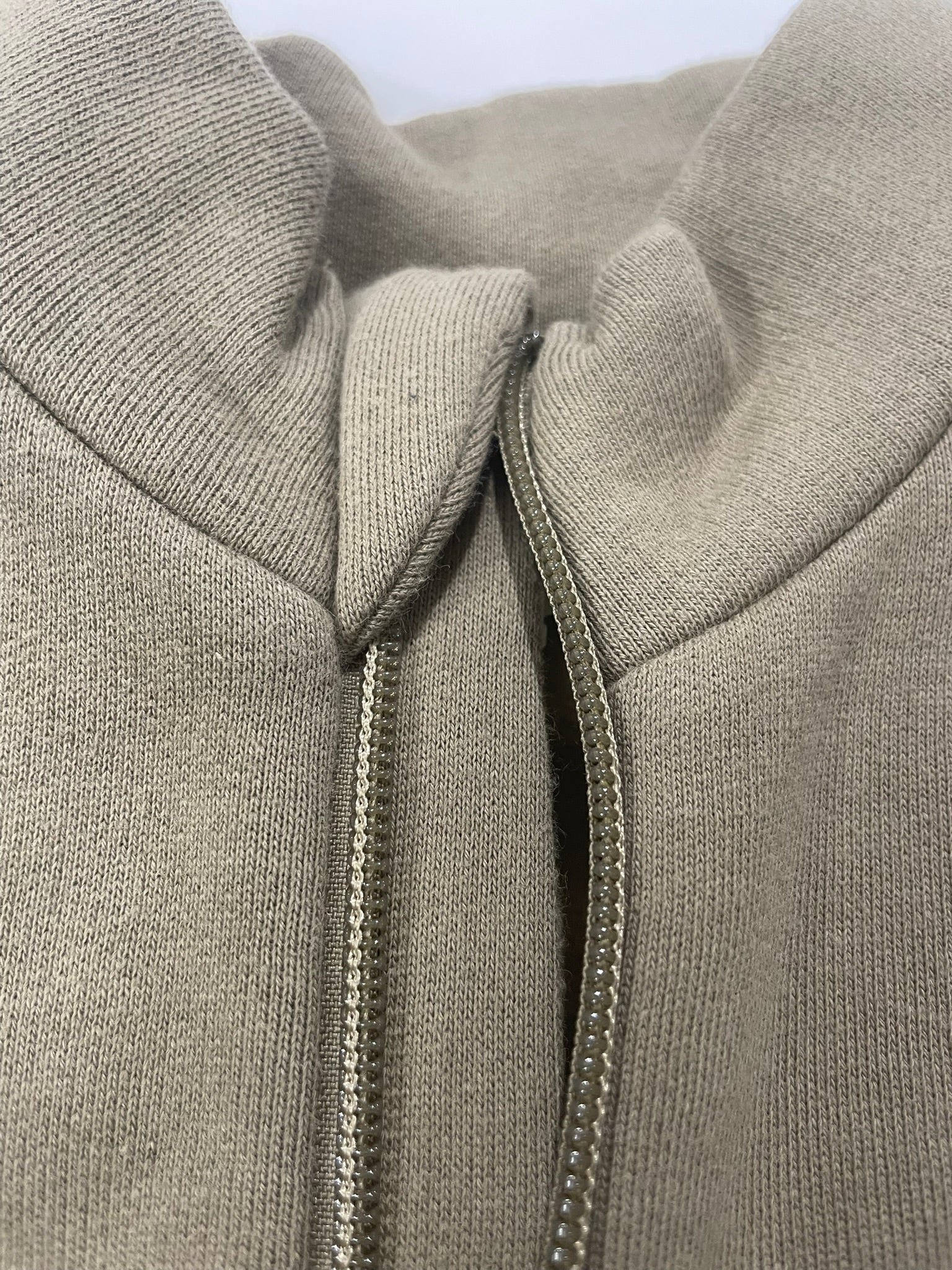Sunwray olive organic zip sweatshirt close up patch detail