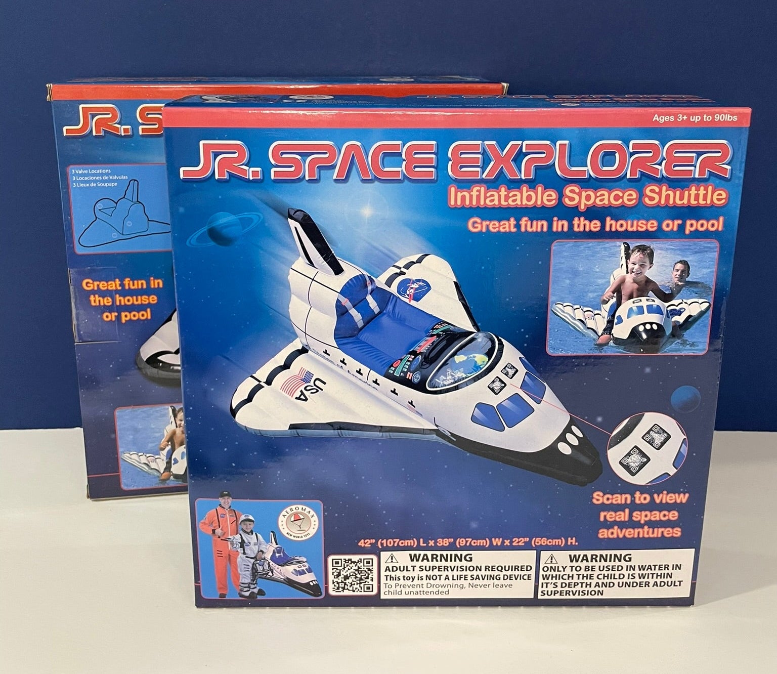 Inflatable space shuttle packaging with blue and white design on a dark blue background