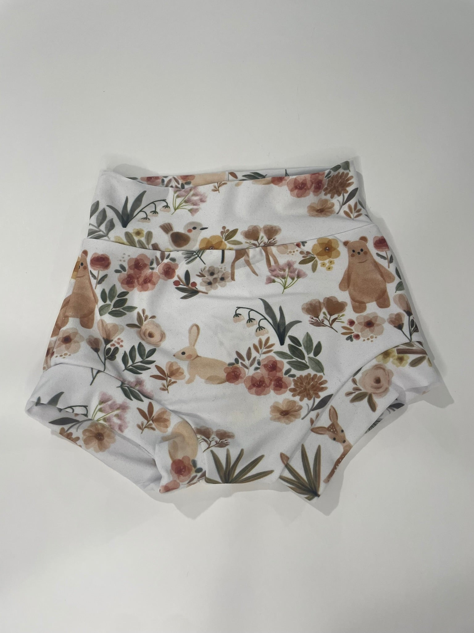 Floral woodland baby bummies worn lifestyle view
