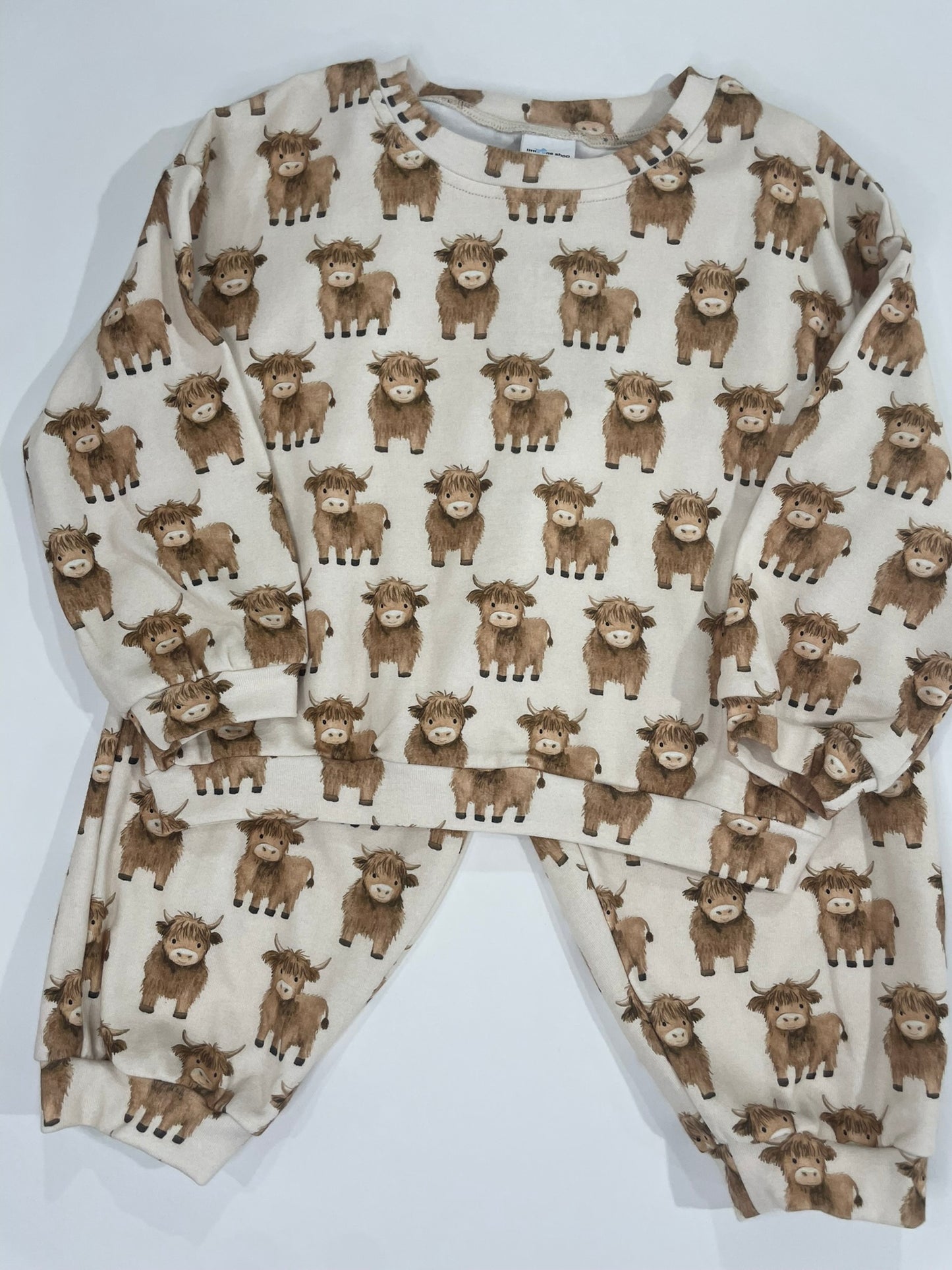 Mini Highland sweatsuit flat lay product view