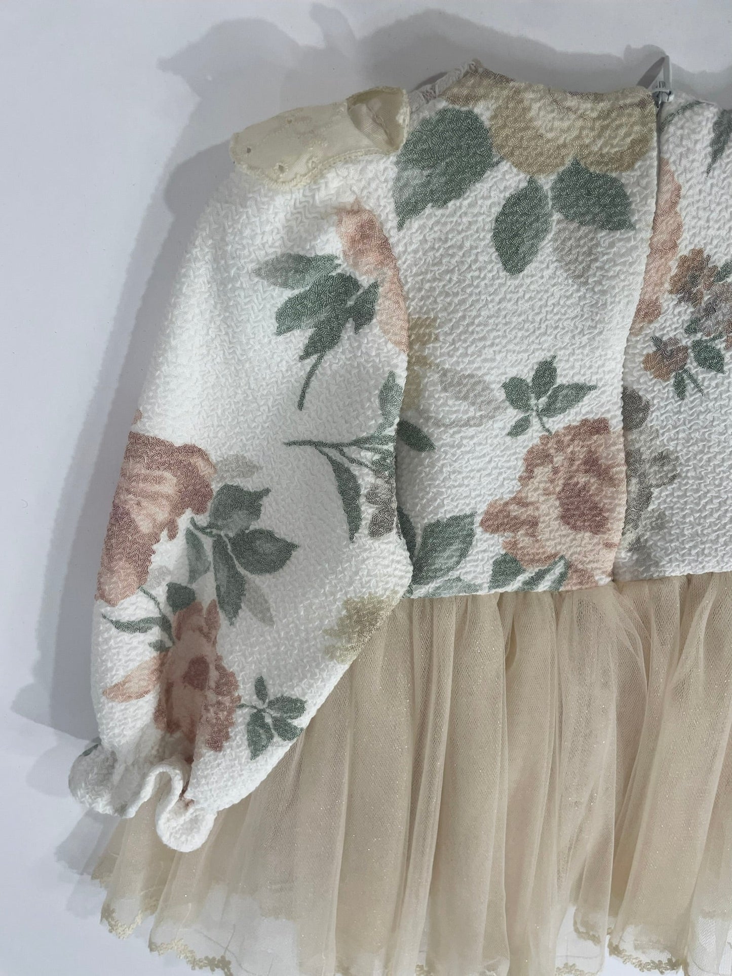 Floral-patterned fabric swatches on a white background