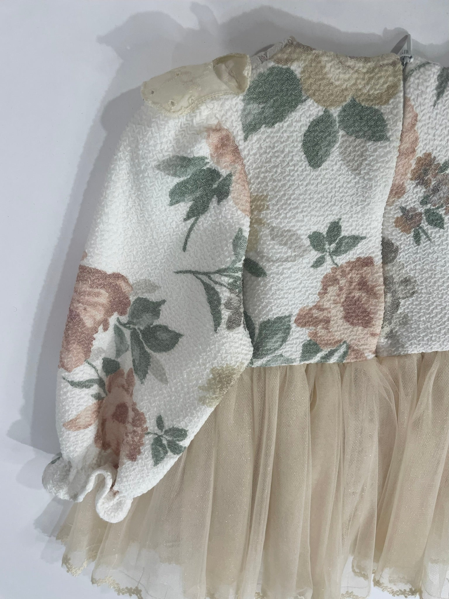 Floral-patterned fabric swatches on a white background