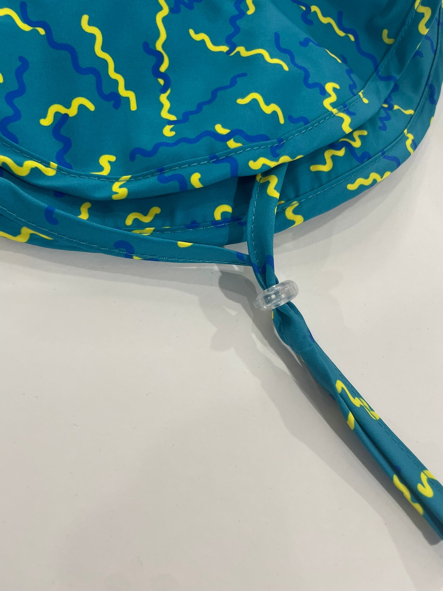 Squiggle sun hat for kids worn outdoor lifestyle view