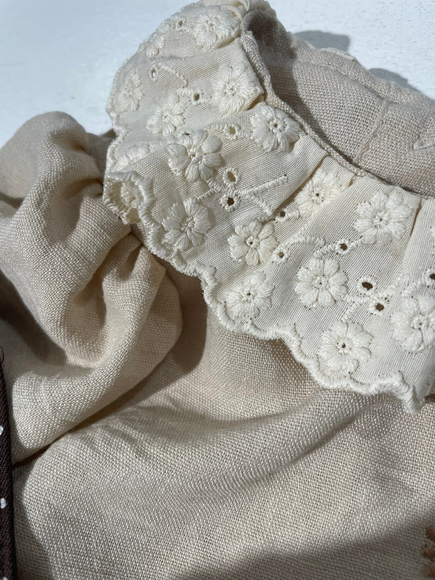 Cora baby top and suspender 2 piece set fabric close up view