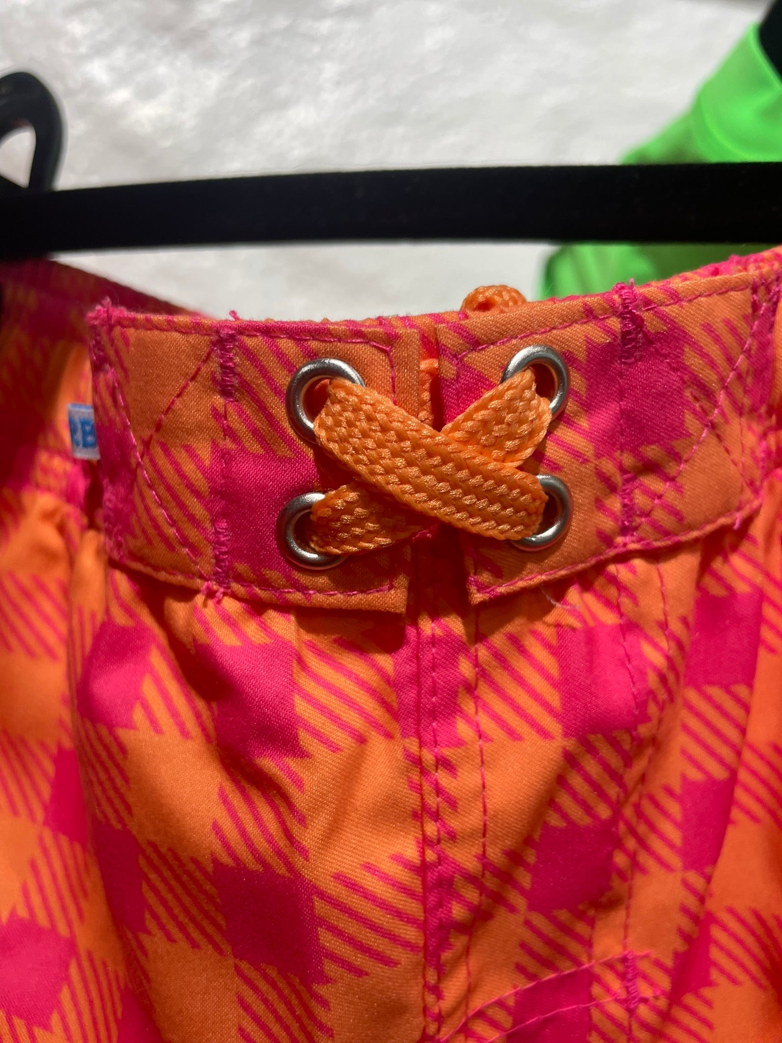 Hi-Vis sunset sorbet gingham swim trunks for boys detail view