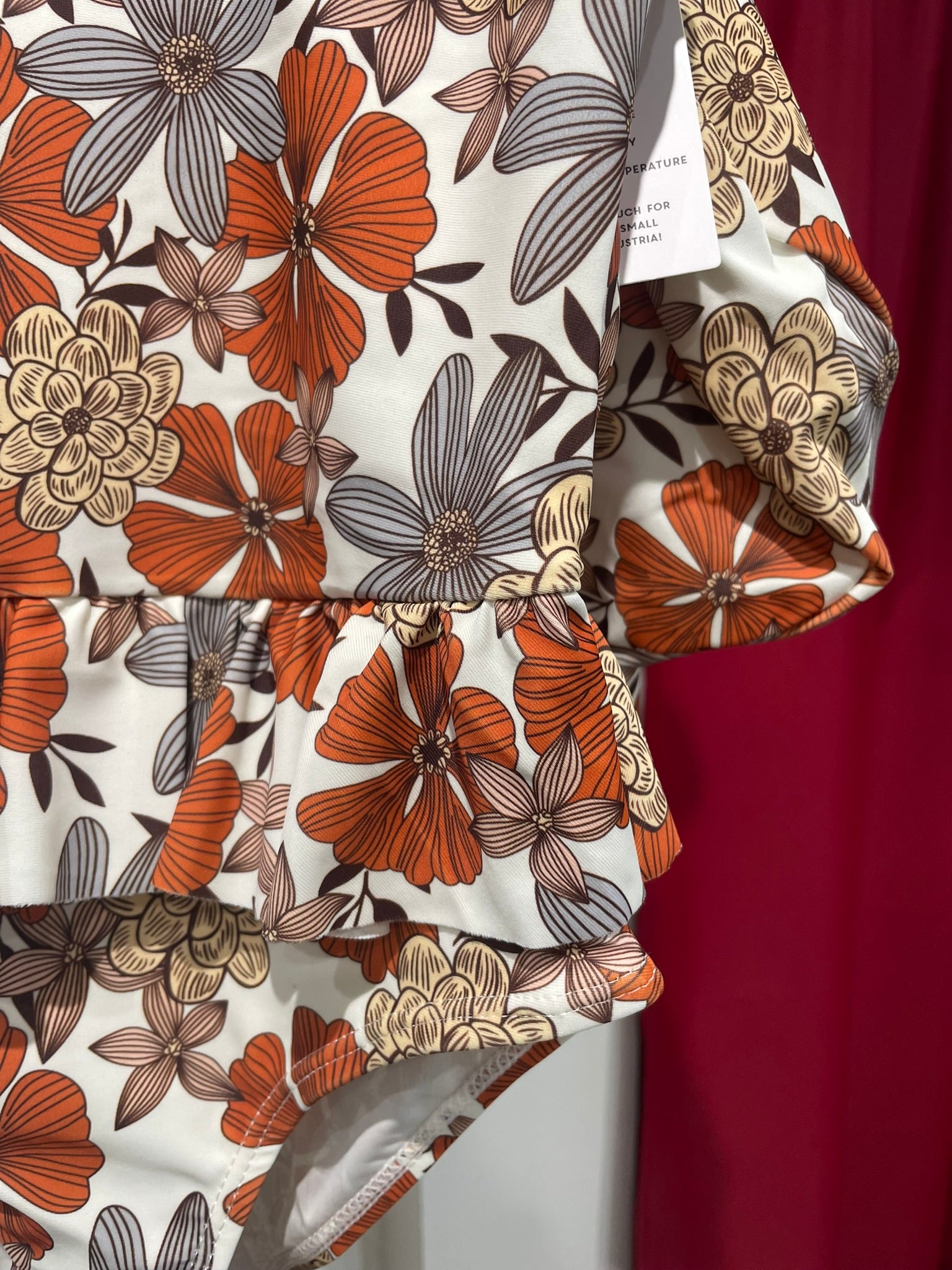Girls in floral safari swimsuit outdoor summer view