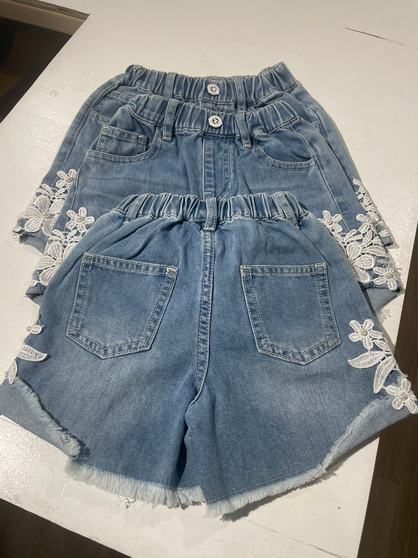 Girls lace patch shorts side view detail