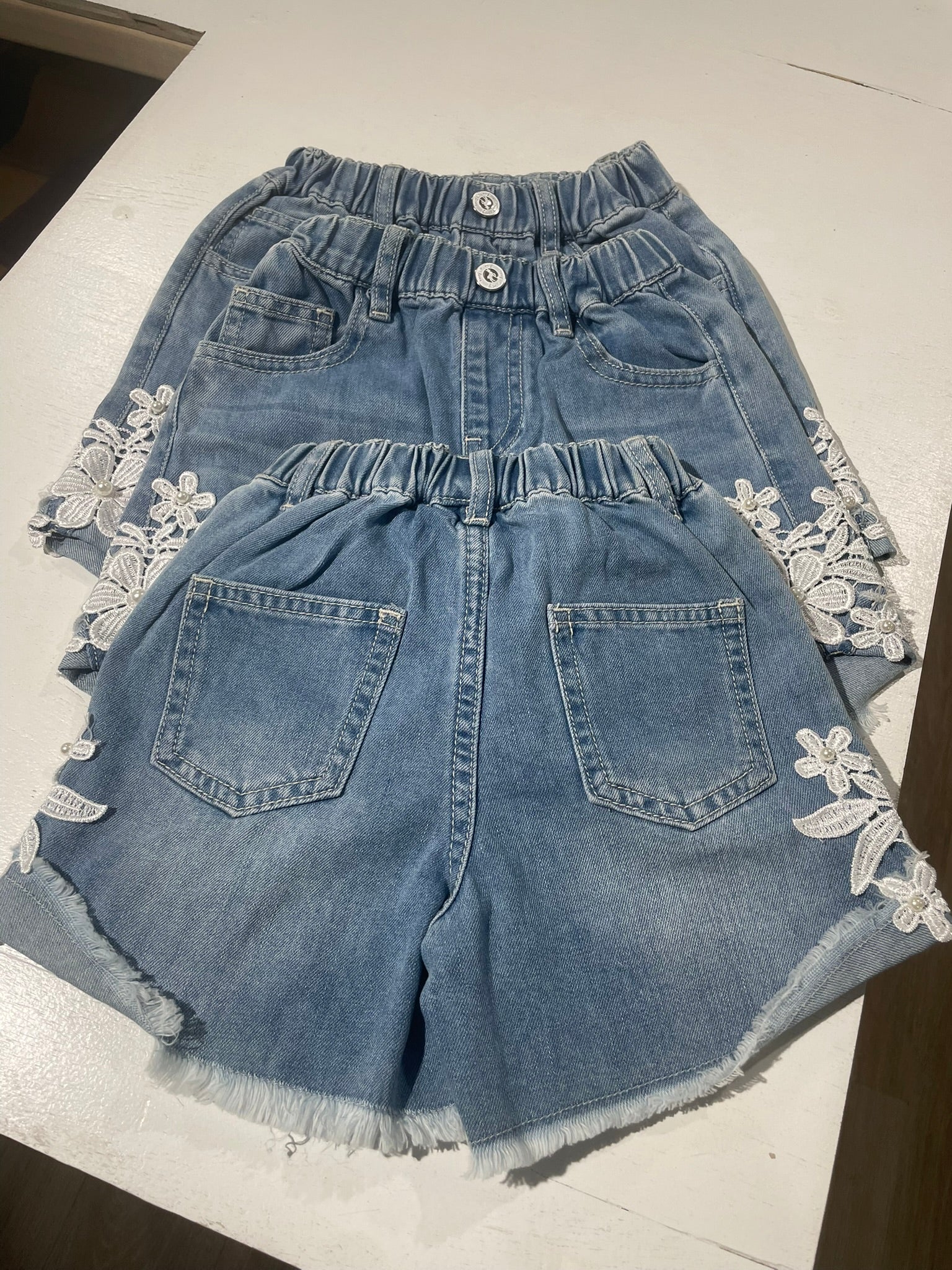 Girls lace patch shorts side view detail