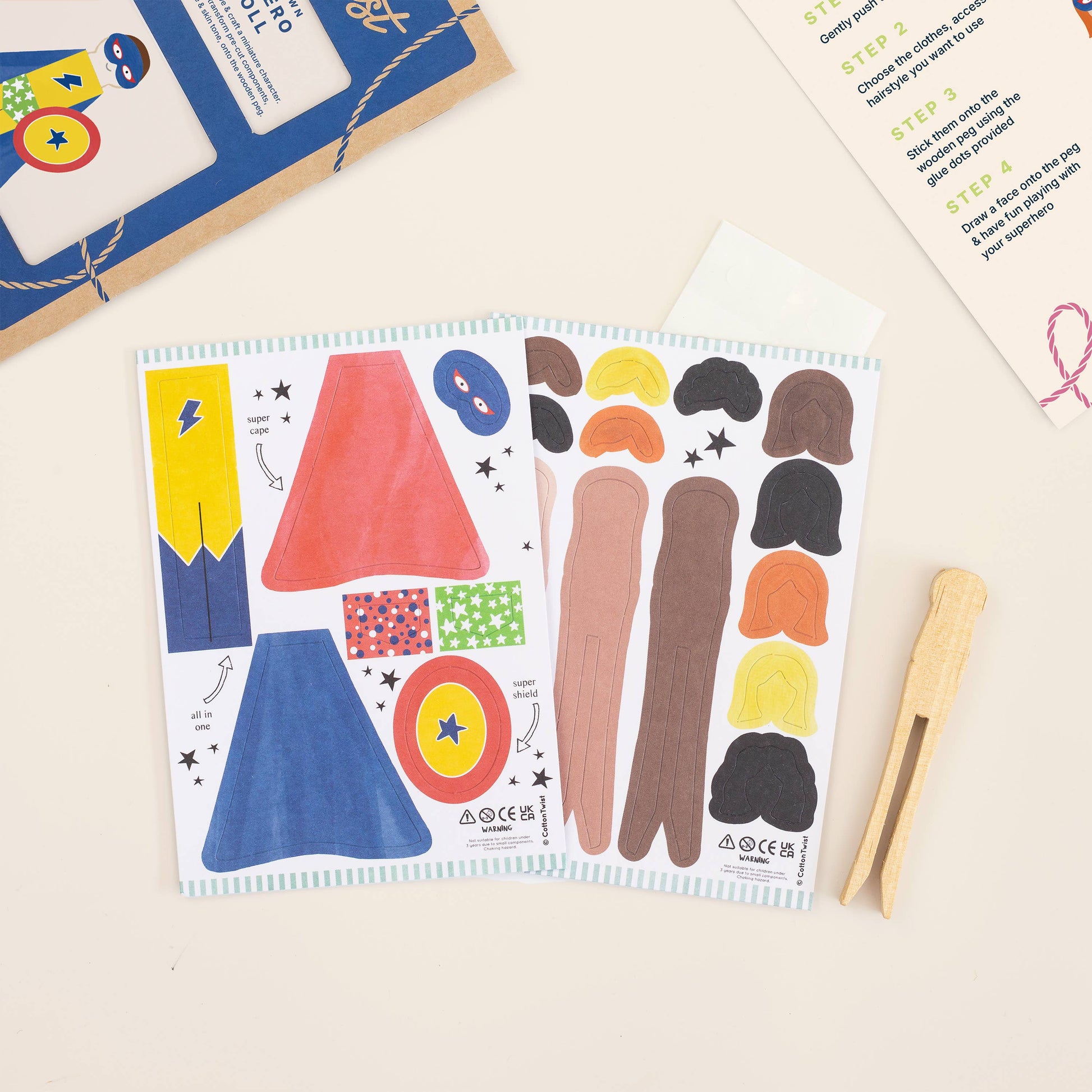 Superhero peg doll craft kit flat lay product view