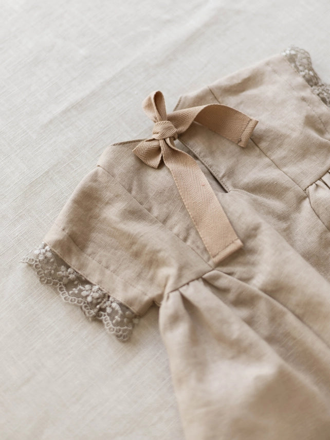 Girls Malia beige dress worn lifestyle view
